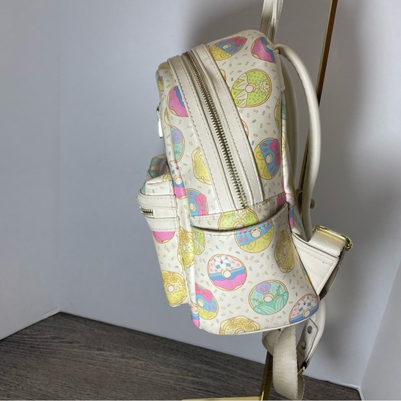 Loungefly Disney mini backpack. Donuts!! Used. Slight stains in lining. See pic - Picture 5 of 11